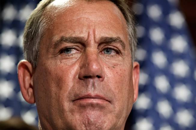 In this July 24, 2012, photo, House Speaker John Boehner, R-Ohio, talks to reporters following a closed-door political strategy session at the Capitol in Washington.