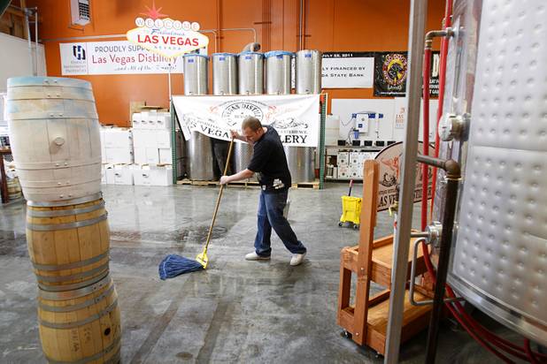 A distillery worker prepares for the Historic First Edition Day at the Las Vegas Distillery in Henderson Saturday, November 17, 2012. The event marks the first bottling of several new spirits and the grand opening of the Booze Brothers Beverage distribution company and the Half Full Artisan Shop at the Distillery, a retail store. The spirits include Nevada vodka, whiskey, gin, rum and moonshine.