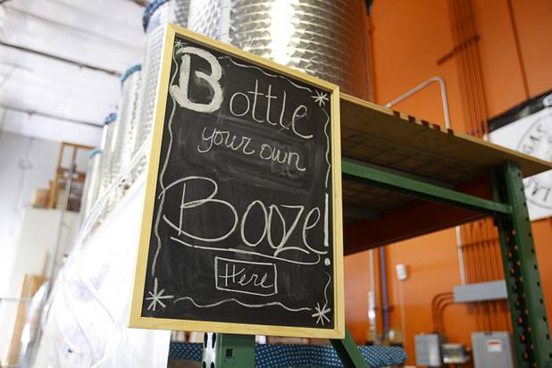 A bottling station is marked with a sign during the Historic First Edition Day at the Las Vegas Distillery in Henderson Saturday, November 17, 2012. The event marks the first bottling of several new spirits and the grand opening of the Booze Brothers Beverage distribution company and the Half Full Artisan Shop at the Distillery, a retail store. The spirits include Nevada vodka, whiskey, gin, rum and moonshine.