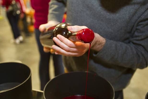 Travis Drake seals the top of a Nevada Whiskey bottle with wax during the Historic First Edition Day at the Las Vegas Distillery in Henderson Saturday, November 17, 2012. The event marks the first bottling of several new spirits and the grand opening of the Booze Brothers Beverages distribution company and the Half Full Artisan Shop at the Distillery, a retail store. The spirits include Nevada vodka, whiskey, gin, rum and moonshine.
