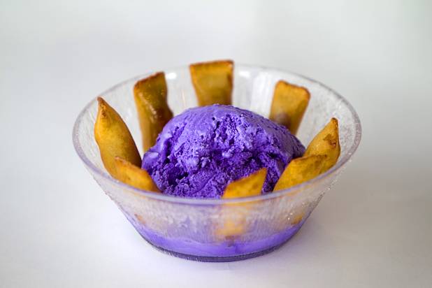 Bananas in Pajamas at California Crab, a restaurant at 9560 S. Eastern Ave. Sunday, November 18, 2012. Bananas in Pajamas ($6.99) is a bowl of Magnolia ube, a Filipino purple yam ice cream, surrounded by small sticks of hot fried bananas.