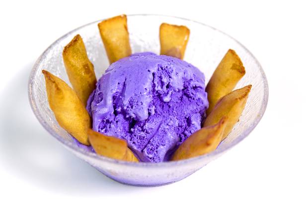 Bananas in Pajamas at California Crab, a restaurant at 9560 S. Eastern Ave. Sunday, November 18, 2012. Bananas in Pajamas ($6.99) is a bowl of Magnolia ube, a Filipino purple yam ice cream, surrounded by small sticks of hot fried bananas.