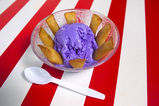 Bananas in Pajamas at California Crab, a restaurant at 9560 S. Eastern Ave. Sunday, November 18, 2012. Bananas in Pajamas ($6.99) is a bowl of Magnolia ube, a Filipino purple yam ice cream, surrounded by small sticks of hot fried bananas.