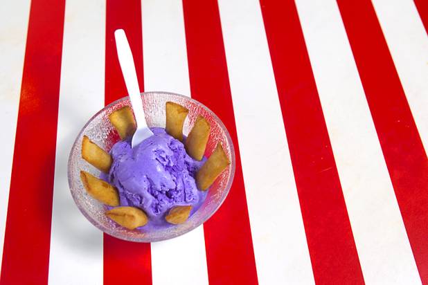 Bananas in Pajamas at California Crab, a restaurant at 9560 S. Eastern Ave. Sunday, November 18, 2012. Bananas in Pajamas ($6.99) is a bowl of Magnolia ube, a Filipino purple yam ice cream, surrounded by small sticks of hot fried bananas.