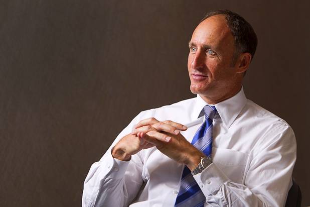 Michael Mixer, managing partner/Las Vegas for Colliers International, listens to a question during an interview at the commercial real estate brokerage Monday, November 19, 2012. Mixer is part of a Colliers gaming group focused on helping investors buy and sell casinos and gaming property.