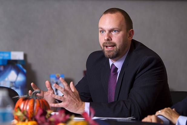 Joshua Smith responds to a question during an interview at the Colliers International commercial real estate brokerage Monday, November 19, 2012. Smith is part of a Colliers gaming group focused on helping investors buy and sell casinos and gaming property.