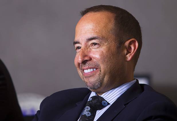 Gabriel Telles listens during an interview at the Colliers International commercial real estate brokerage Monday, November 19, 2012. Telles is part of a Colliers gaming group focused on helping investors buy and sell casinos and gaming property.