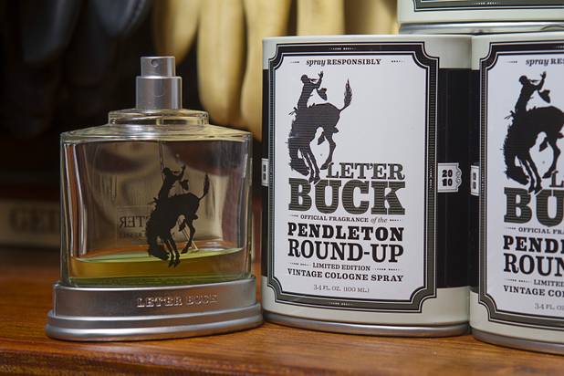 Let'er Buck cologne, the official fragrance of the Pendleton Round-Up rodeo, is displayed at the Pinto Ranch western wear store in the Fashion Show Mall Monday, November 19, 2012. The packaging advises to "spray responsibly."