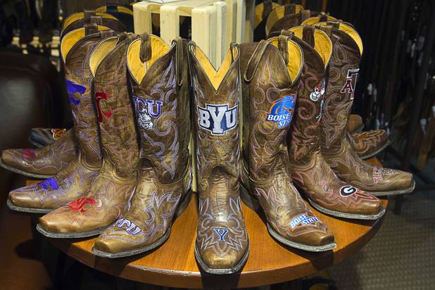 Gameday Boots ($400) are displayed at the Pinto Ranch western wear store in the Fashion Show Mall Monday, November 19, 2012. The boots have official licensing agreements with over 70 colleges (but not yet with UNLV or UNR).