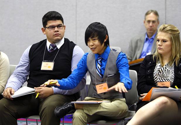 Jennifer Deng, center, of Ranch High School makes a point during the annual Las Vegas Sun Youth Forum at the Las Vegas Convention Center Tuesday, November 20, 2012.