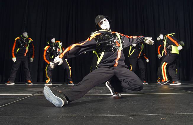 Jabbawockeez perform for students at lunch during the annual Las Vegas Sun Youth Forum at the Las Vegas Convention Center Tuesday, November 20, 2012.