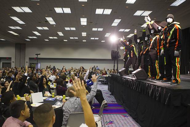 Jabbawockeez salute the audience after a performance during the annual Las Vegas Sun Youth Forum at the Las Vegas Convention Center Tuesday, November 20, 2012.