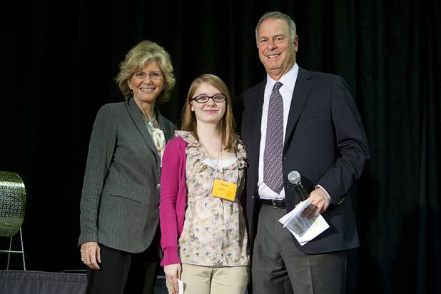 Scholarship winner Clarissa Crosby of the College of Southern Nevada High School (East) poses with Janie Greenspun-Gale and Brian Greenspun during the annual Las Vegas Sun Youth Forum at the Las Vegas Convention Center Tuesday, November 20, 2012.