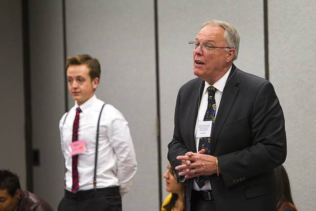 Ralph Cadwallader, right, emeritus executive director of the Nevada Association of School Administrators, moderates a discussion during the annual Las Vegas Sun Youth Forum at the Las Vegas Convention Center Tuesday, November 20, 2012.