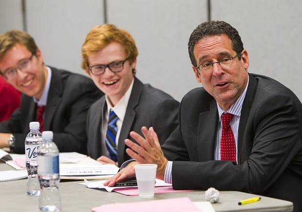 Rob Lang, right, executive director of the Lincy Institute, moderates a discussion during the annual Las Vegas Sun Youth Forum at the Las Vegas Convention Center Tuesday, November 20, 2012.
