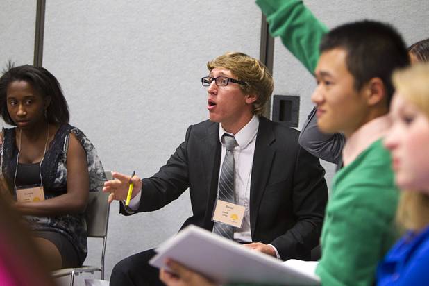 Daniel Drake of Cimarron-Memorial High School defends his position during the annual Las Vegas Sun Youth Forum at the Las Vegas Convention Center Tuesday, November 20, 2012.