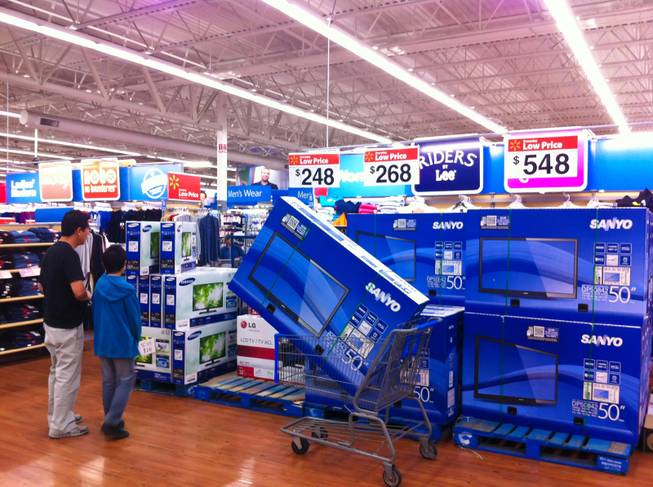 Shoppers search for Black Friday deals at Wal-Mart on Eastern Ave. and Serene, Friday, Nov. 23, 2012.