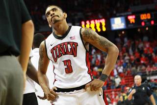 UNLV guard Anthony Marshall walks off the court after the Runnin' Rebels were upset by Oregon 83-79 Friday, Nov. 23, 2012 in the Global Sports Classic.
