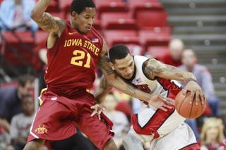 Iowa State guard Will Clyburn defends UNLV guard Anthony Marshall during their game Saturday, Nov. 24, 2012 in the Global Sports Classic at the Thomas & Mack Center.