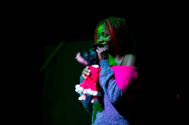 Wassa Coulibaly performs at Baobab Stage theater during dress rehearsals for her original work “The Red Dress”, Tuesday, Oct. 30, 2012.