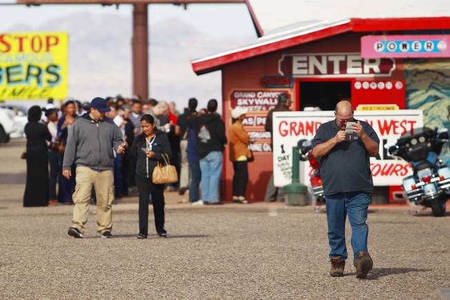 As the jackpot in the multi-state Powerball lottery passes $500 million, buyers leave the Arizona Last Stop in White Hills, Ariz. Tuesday, Nov. 27, 2012.