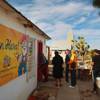 As the jackpot in the multi-state Powerball lottery passes $500 million, hopeful ticket buyers queue up outside Rosie's Den in White Hills, Ariz. Tuesday, Nov. 27, 2012.