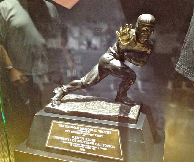 Marcus Allen's Heisman Trophy is among items on display at Score!,  the interactive fantasy sports exhibit at the Luxor in Las Vegas.