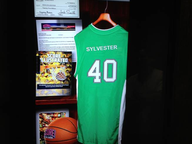 Visitors get a personalized view of what their locker might have looked like as a professional athlete as part of the sports fantasy experience at Score! at the Luxor in Las Vegas.