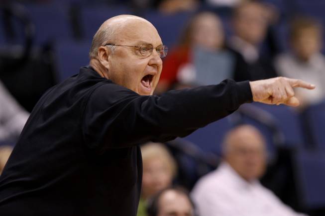 In this photo taken on Friday, Oct. 30, 2009, then-Saint Louis basketball coach Rick Majerus instructs his team during the first half of a preseason NCAA college basketball game against Arkansas Fort-Smith. Majerus died Dec. 1. He was 64.