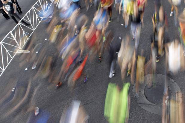 Runners are head out from the start line during the Zappos.com Rock 'n' Roll Las Vegas Marathon Sunday, Dec. 2, 2012.