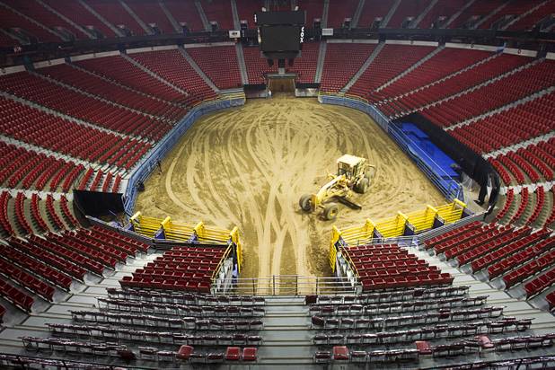 1:30 p.m. - Most of the dirt work is finished on the arena floor as workers prepare the Thomas & Mack Center for the National Finals Rodeo Sunday, Dec. 2, 2012. This year's NFR begins Thursday, Dec. 6 and runs through Saturday Dec. 15.