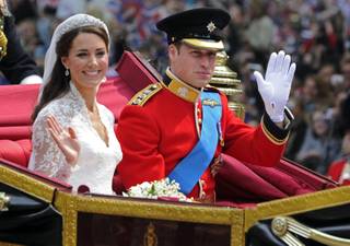 In this Friday April 29, 2011 file photo Britain's Prince William and his bride Kate, Duchess of Cambridge, leave Westminster Abbey, London, following their wedding.  
