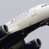 A Delta Air Lines jet takes off at the Detroit Metropolitan Airport in Romulus, Mich., July 22, 2011.