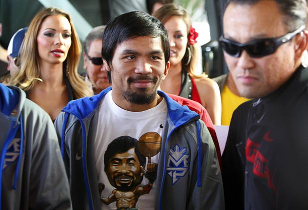 Filipino boxer Manny Pacquiao arrives at the MGM Grand Tuesday, December 4, 2012. Pacquiao will take on Juan Manuel Marquez of Mexico in a welterweight bout at the MGM Grand Garden Arena on Saturday. It will be the fourth time for the boxers to fight each other.