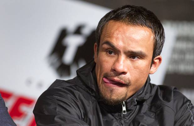 Mexican boxer Juan Manuel Marquez attends a news conference at the MGM Grand Wednesday, Dec. 5, 2012. Marquez and Filipino boxer Manny Pacquiao will fight for a fourth time in a welterweight bout at the MGM Grand Garden Arena Saturday.