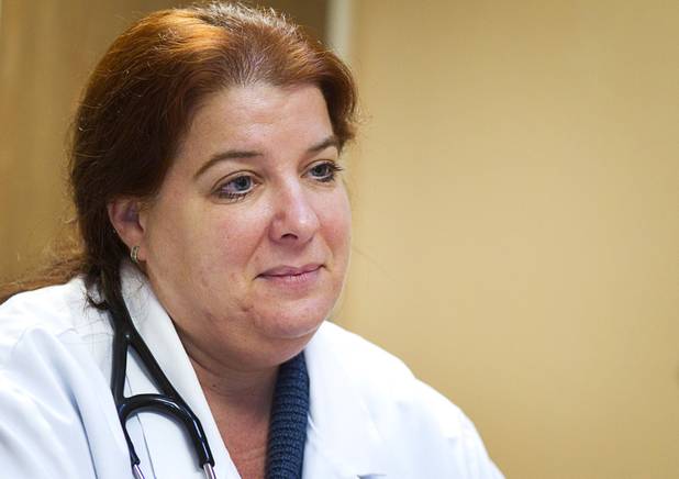Dr. Rebecca Edgeworth listens to a question during an interview at the Volunteers in Medicine of Southern Nevada clinic near Tropicana Avenue and McLeod Drive Wednesday, December 5, 2012. The group is raising funds to build a new clinic in downtown Las Vegas.