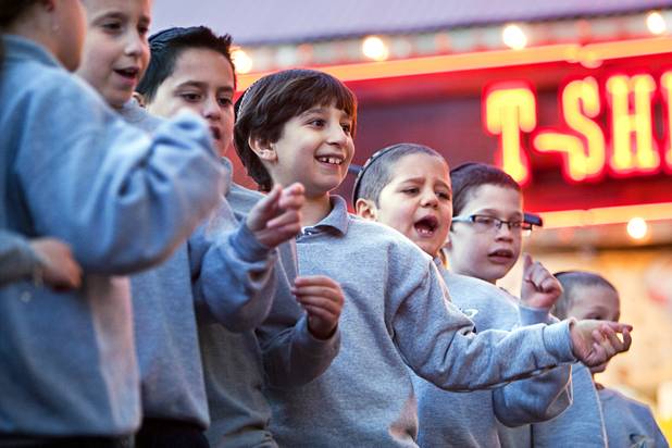 Members of the Desert Torah Academy choir perform before a Hanukah menorah lightning ceremony at the Fremont Street Experience in downtown Las Vegas Sunday, Dec. 9, 2012.  Chabad of Southern Nevada sponsored the event. The Jewish holiday of Hanukah started Saturday evening and runs though Dec. 16.