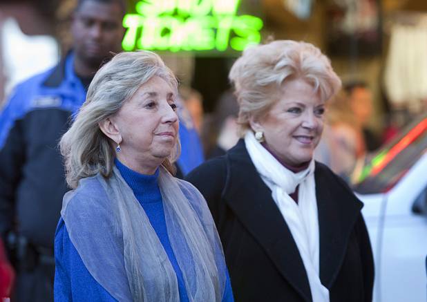 Congresswoman Dina Titus (D-NV), left, and Las Vegas Mayor Carolyn Goodman attend a Hanukah menorah lightning ceremony at the Fremont Street Experience in downtown Las Vegas Sunday, Dec. 9, 2012.  Chabad of Southern Nevada sponsored the event. The Jewish holiday of Hanukah started Saturday evening and runs though Dec. 16.