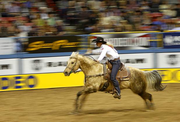 Barrel racer Sherry Cervi of Marana, Ariz. competes during the fourth go-round of the Wrangler National Finals Rodeo at the Thomas & Mack Center Sunday, Dec. 9, 2012. Cervi had the best time of the night at 13.67 seconds. The NFR continues through Saturday.