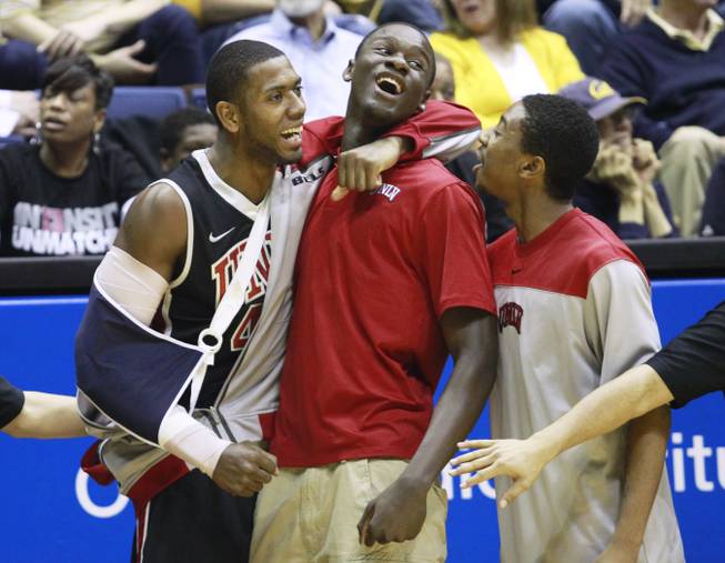 UNLV forward Mike Moser hugs Demetris Morant as they they pull ahead of Cal during the second half of their game Sunday, Dec. 9, 2012 at Haas Pavilion in Berkeley, Calif. UNLV won 76-75.