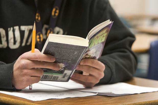 Aarik Poeling reads a Stephen King novel during his English ...