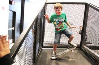 Sheila Tarr Elementary School fifth-grader Donovan Terzian, 10, experiments with balance at the 