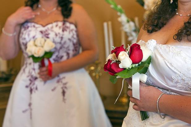 Brides prepare for their wedding at the Chapel of the Flowers on Las Vegas Boulevard South Wednesday, Dec. 12, 2012. Twelve couples got married at 12:12 pm at the chapel as part of a KOMP 92.3 radio station promotion. Las Vegas wedding chapels were busy all day as many couples wanted to get married on the date of 12-12-12.
