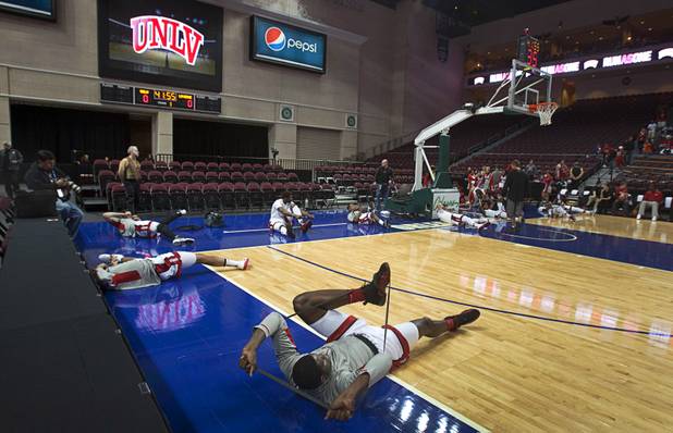 Anthony Bennett, foreground, and other UNLV Rebels stretch out before their game against the La Verne Leopards at the Orleans Arena Thursday, Dec. 13, 2012. UNLV is playing at the Orleans because the the Thomas & Mack Center is hosting the Wrangler National Finals Rodeo through Saturday. 