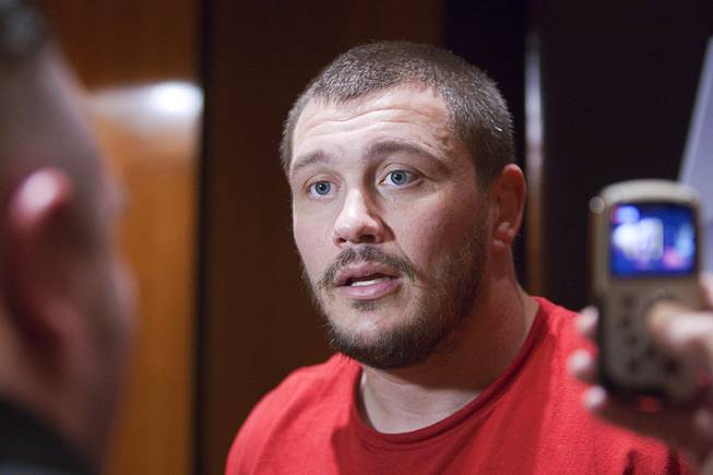 Heavyweight fighter Matt Mitrione talks to reporters during UFC Ultimate Fighter Finale workouts at the Hard Rock Thursday, Dec. 13, 2012.