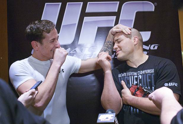 Welterweight fighter Mike Ricci, left, laughs as Pat Barry makes an impersonation of Ricci during UFC Ultimate Fighter Finale workouts at the Hard Rock Thursday, Dec. 13, 2012.
