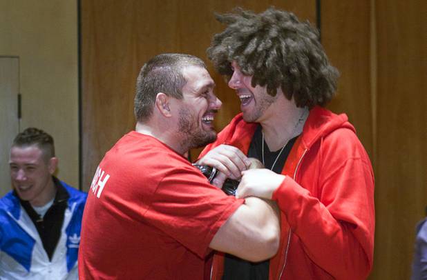 Heavyweight fighter Matt Mitrione jokes with "Scape," a Tapout co-founder, during UFC Ultimate Fighter Finale workouts at the Hard Rock Thursday, Dec. 13, 2012.