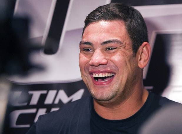 Heavyweight fighter Shane Del Rosario laughs as he talks with reporters during UFC Ultimate Fighter Finale workouts at the Hard Rock Thursday, Dec. 13, 2012.