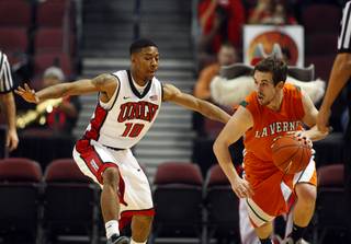 UNLV Rebel Daquan Cook guards Jake Vieth during their game against the La Verne Leopards at the Orleans Arena Thursday, Dec. 13, 2012.