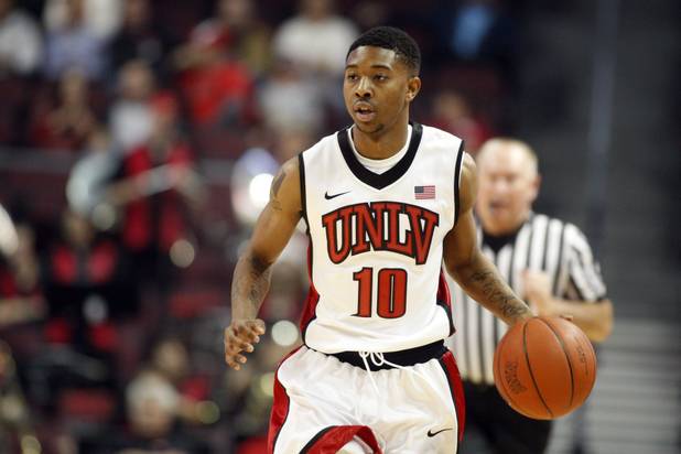 UNLV's Daquan Cook takes the ball downcourt during UNLV's game against the La Verne Leopards at the Orleans Arena Thursday, Dec. 13, 2012.